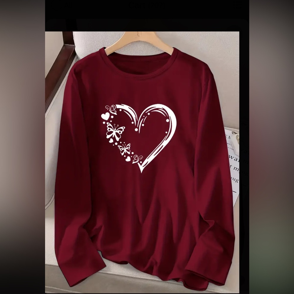 Red long sleeve shirt with heart and butterfly design